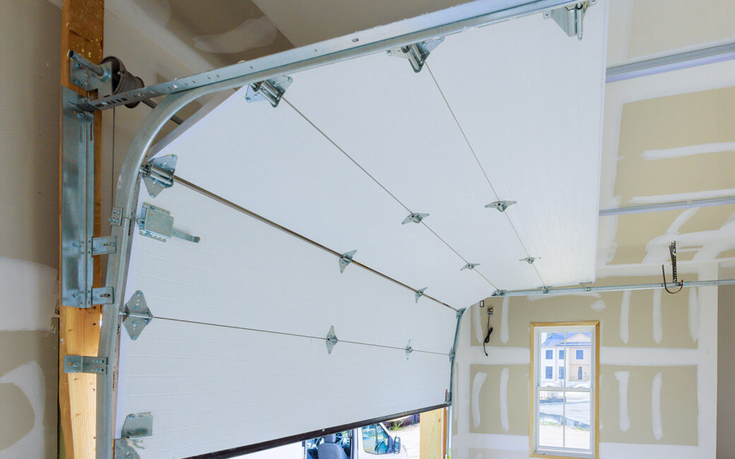 Installation of rolling shutters plastic garage doors in new house
